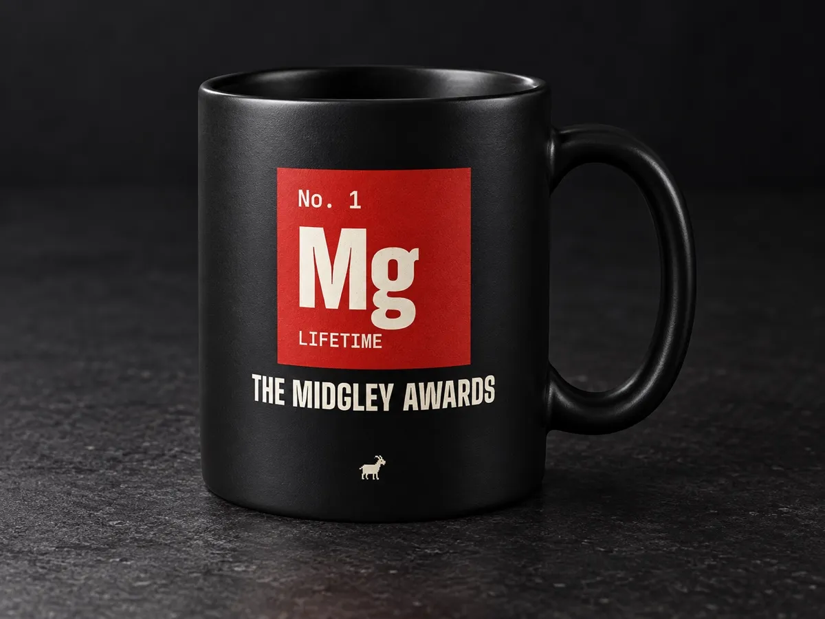 Matte-black mug with the red No. 1 Mg Lifetime periodic-table award tile